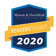 A badge-shaped graphic with text: "Mason & Deerfield Lifestyle Readers' Choice 2020" in white and yellow on a navy blue background.
